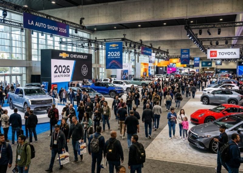 Crowds of visitors exploring car exhibits inside the Los Angeles Convention Center at the 2026 LA Auto Show