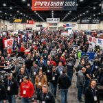 Thousands of motorsports professionals browsing exhibition booths at the 2026 Performance Racing Industry Show at the Indiana Convention Center in Indianapolis