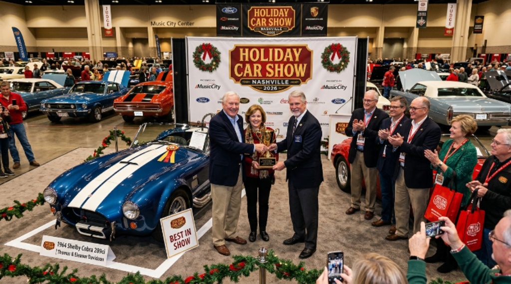 Visitors admiring a fully restored 1960s vintage hot rod with custom paint under warm exhibition lighting at the Nashville holiday classic car show, December 2026