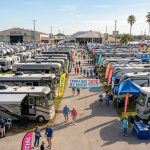 Rows of motorhomes and travel trailers on display at the Tampa Bay RV Show 2026 at Florida State Fairgrounds